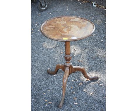 A small antique tripod table.This lot can only be collected on Saturday 1st August (10-2pm) 