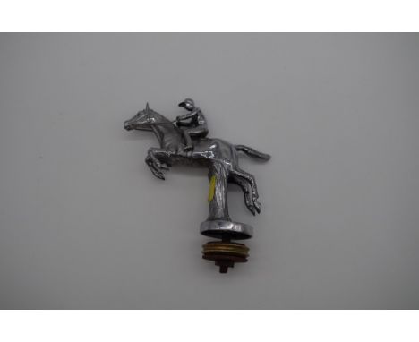 A vintage chrome car mascot,&nbsp;in form of a jockey on horseback, stamped V396, 12cm including fitting. 