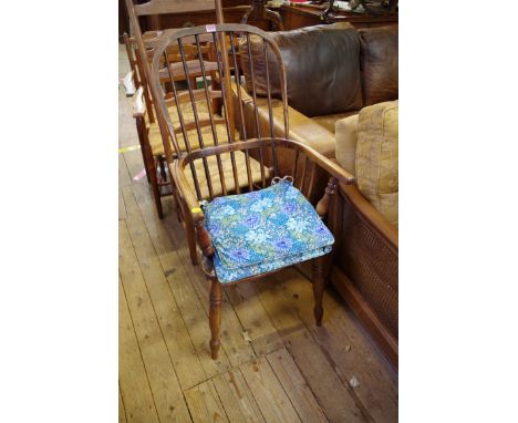 A 19th century ash and elm stick back kitchen elbow chair.&nbsp; 