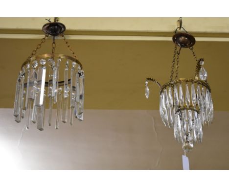 A vintage brass two tier ceiling light, having glass drops, height excluding fitting 18cm. 