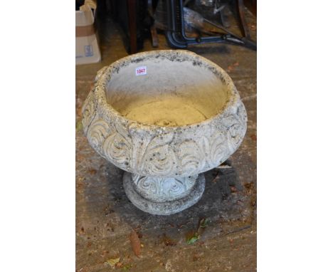 A reconstituted stone planter on pedestal base.This lot can only be collected on Saturday 1st August (10-2pm) 