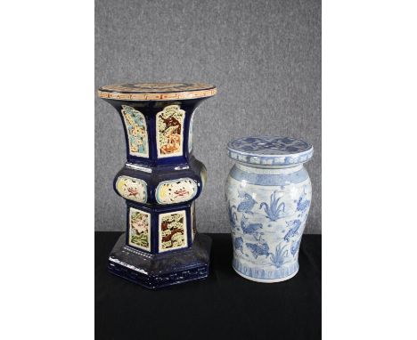 Two modern oriental style ceramic garden stools. Hand painted and decorated with carp. H.41cm. H.53cm. (largest) 