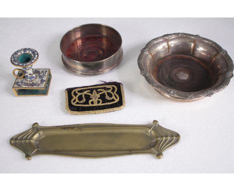 A mixed collection, including a brass enamelled candle holder, a wine bottle holder, brass tray and two bowls. L27cm. (larges