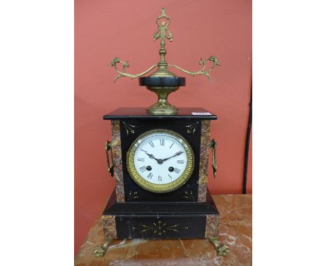 A 19th Century French Belge noir, marble and ormolu mantel clock