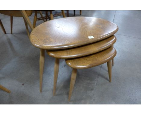 An Ercol Golden Dawn pebble shaped nest of tables