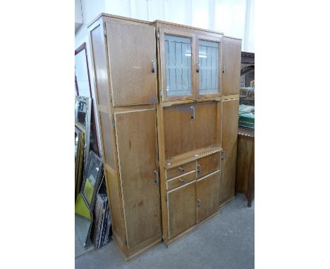 An Art Deco Dorchester oak kitchen cabinet