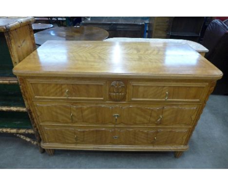A French satin birch commode