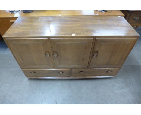 An Ercol Golden Dawn sideboard