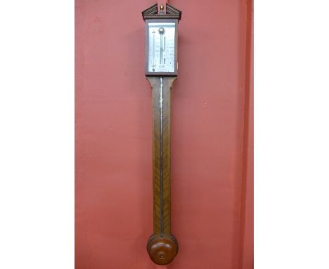 A mahogany stick barometer
