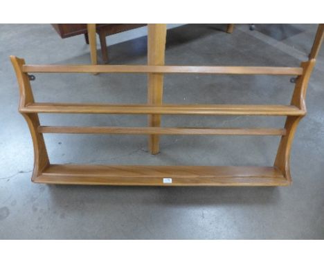 An Ercol Golden Dawn plate rack