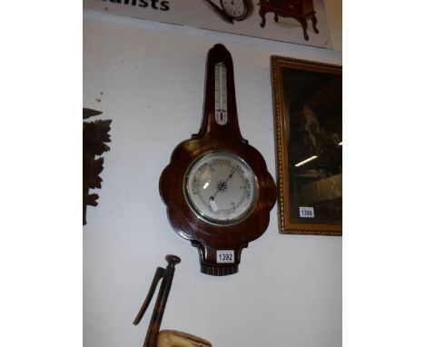 A barometer/thermometer