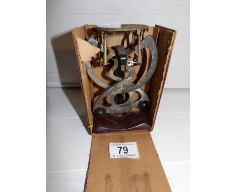 A set of Edwardian postal scales in original distressed box