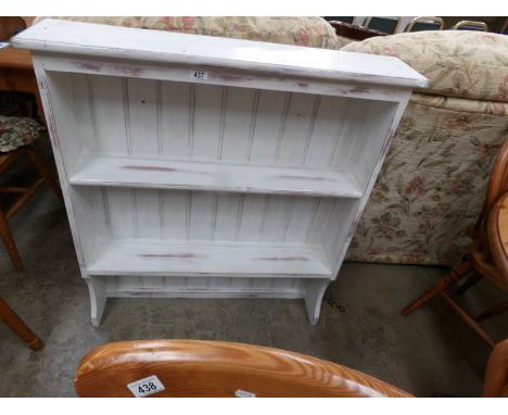 A painted pine kitchen wall shelf