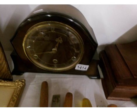 An art deco mantel clock with key