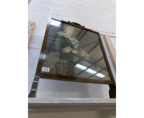 An oak fire screen with print of Bubbles