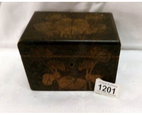 A 19th century poker work tea caddy