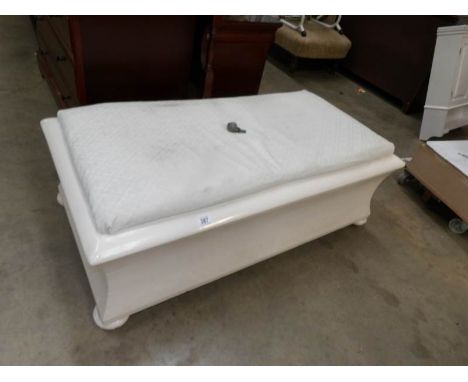 A painted sarcophogus shaped linen trunk