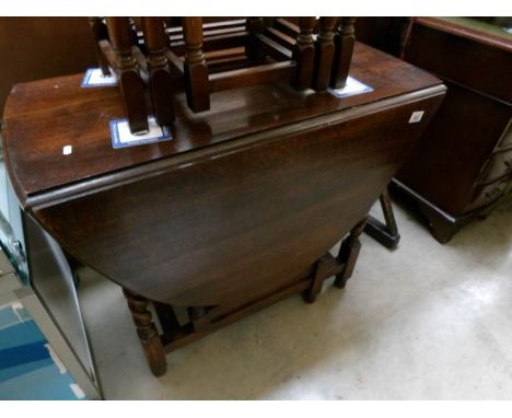 An oak barley twist gate leg table