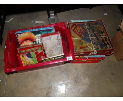 A box of old games including Magic Robot