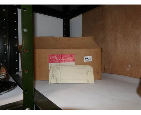 A box of clocking in cards for a Simplex time recorder
