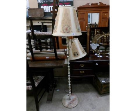 A standard lamp with 2 shades