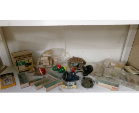 A collection of vintage fishing flies, reels etc