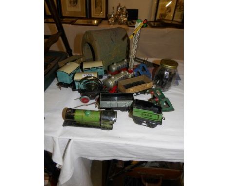 A quantity of Hornby '0' gauge rolling stock, track in tin trunk and quantity of meccano in leather case