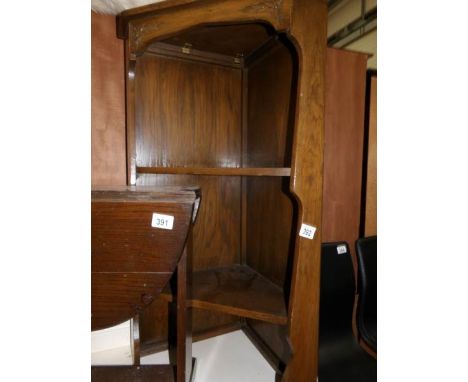 An oak corner shelf
