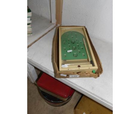 A vintage Chad Valley bagatelle game