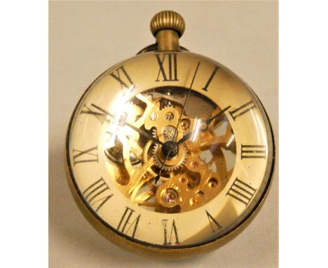 A glass ball desk timepiece, with exposed movement, the silvered chapter ring with Roman numerals, diameter 50 mm. 