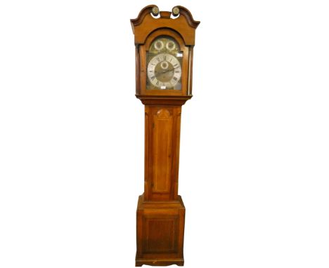 E. Hunt, London, an Edwardian mahogany cased eight day chiming longcase clock, the 12" dial with silvered chapter ring and Ro