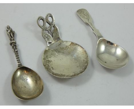 A hand made silver caddy spoon, by APRS, London 2000, Millennium duty mark, with pierced bird motif, a Victorian caddy spoon,