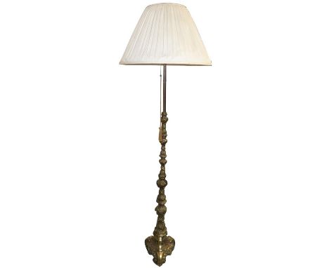 A brass standard lamp, with embossed cast stem, 150 cm. 