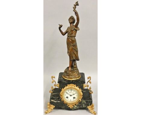 A 19th century French marble, gilt metal and spelter mantle clock, the architectural case with scroll mounts, surmounted by O