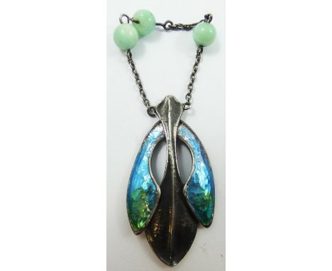 A Continental Art Nouveau silver and enamel pendant, unmarked, c.1905, of leaf form with the remains of a jade bead set chain