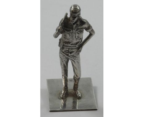 Of British Army interest, a solid silver statue of a soldier, London 1973, dressed in dessert fatigues, wearing a headdress, 