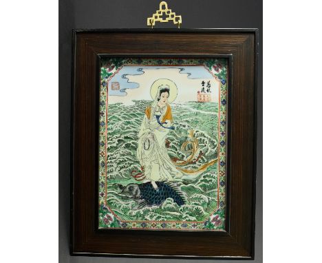 {Porzellanbild.} Kuanyin auf Fisch über Wogen. China. 30 x 23 cm. R