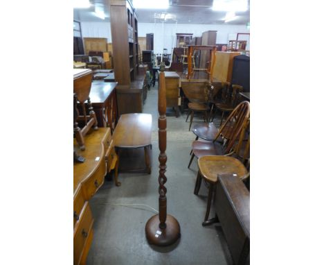 An oak barleytwist standard lamp 