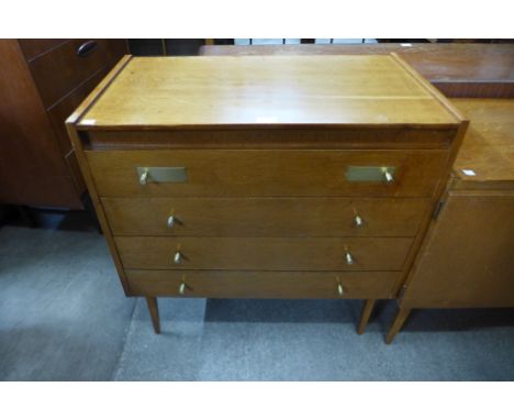 A light oak chest of drawers 