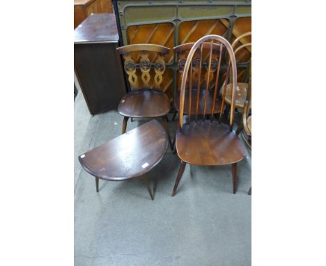 A pair of Ercol Golden Dawn fleur de lys chairs, a Quaker chair and a drop leaf coffee table 