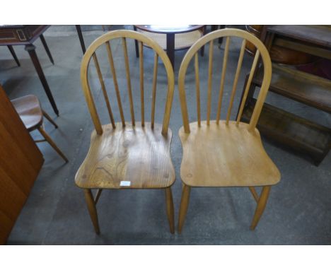 A pair of Ercol Blonde elm and beech Windsor chairs 