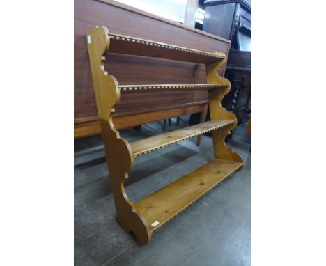 A Victorian pine wall hanging shelf 