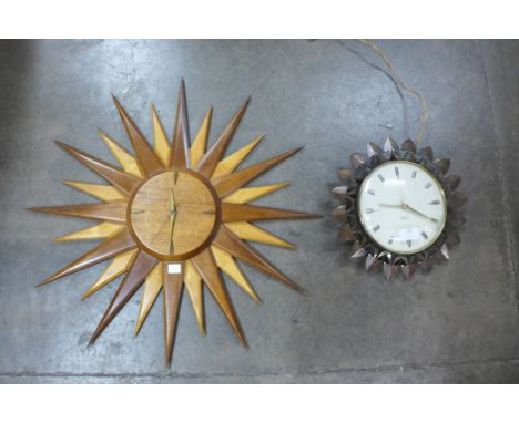 A Westclox Electric brass sunburst wall clock and a teak sunburst wall clock 