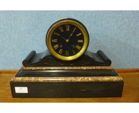 A 19th Century French Japy Freres Belge noir mantel clock, 25cms h 