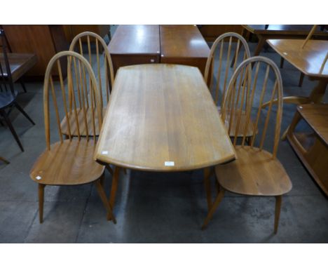 An Ercol Blonde elm and beech Windsor drop-leaf table and four Quaker chairs 