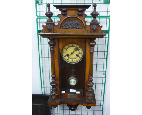 A 19th Century walnut Vienna wall clock, 80cms h 