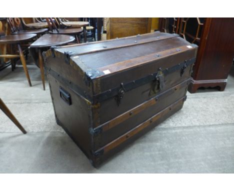 An early 20th Century dome topped steamer trunk 