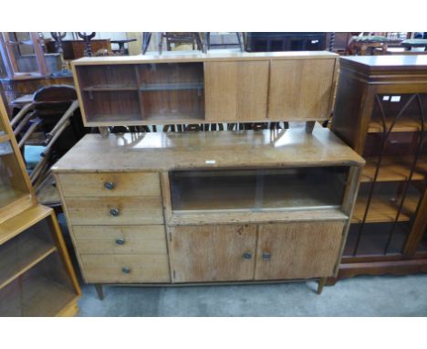 A light oak highboard 