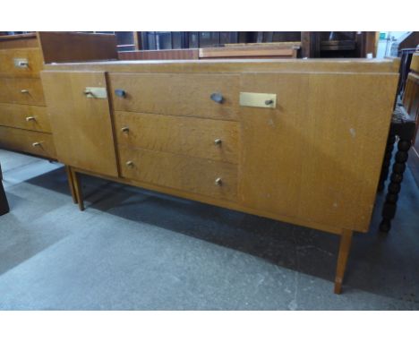 A light oak sideboard 