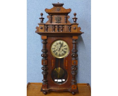A 19th Century walnut Vienna wall clock, 86cms h 
